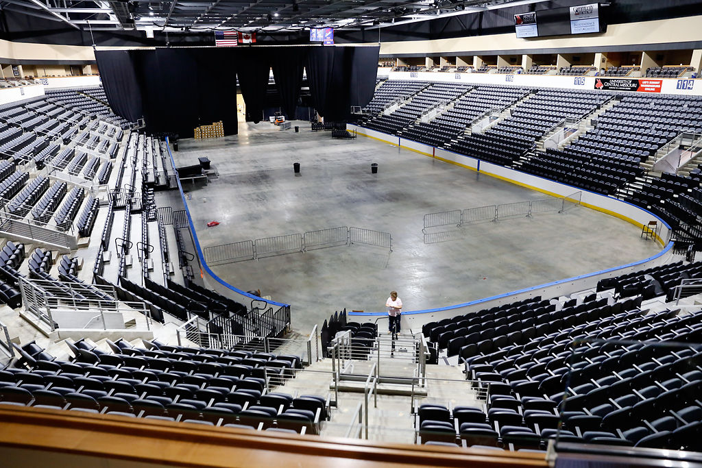 A woman stands in the Independence Events Center's arena
